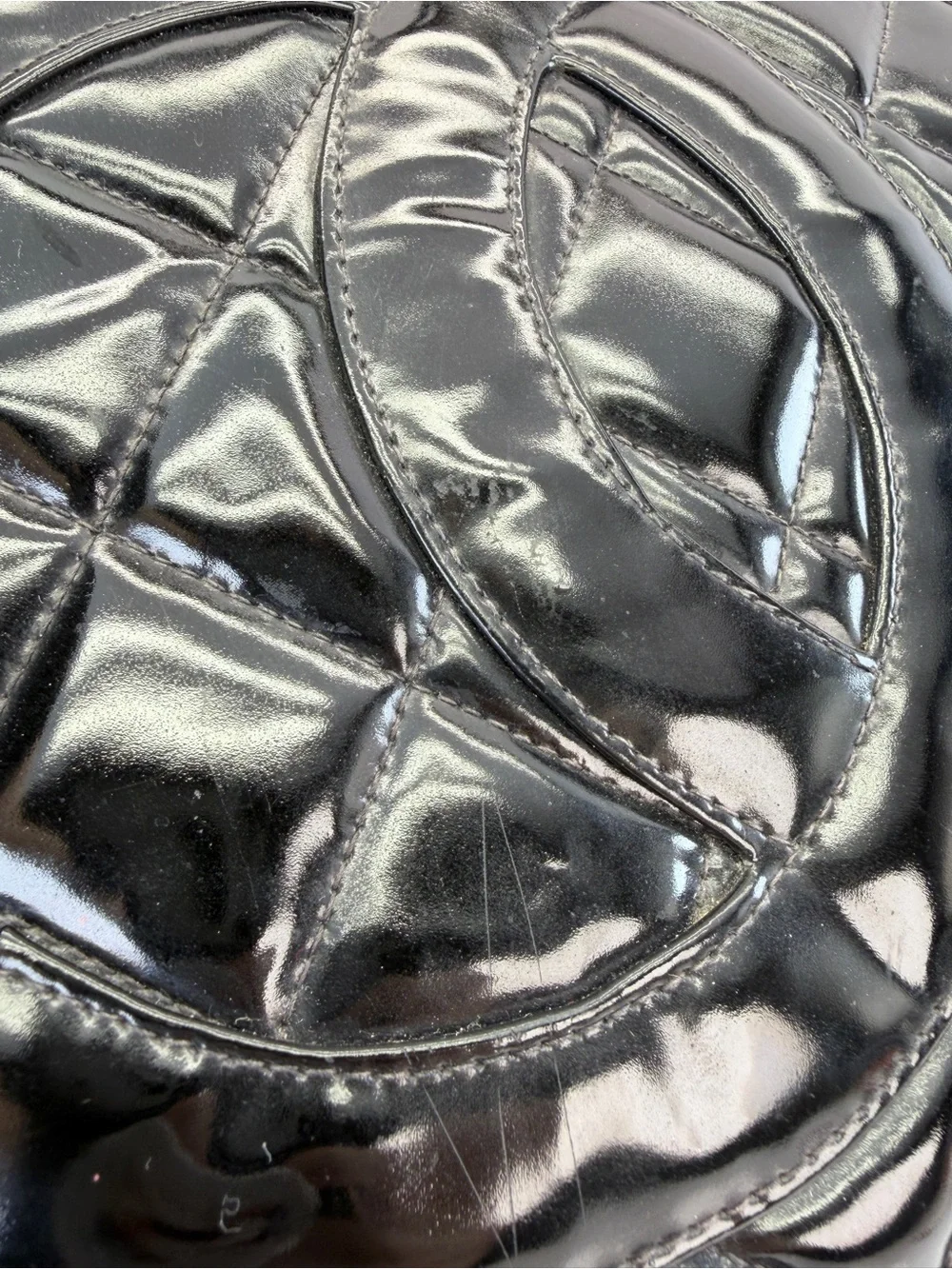 CHANEL Black Quilted Patent Leather Tote with Gold Medallion Charm